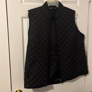 New jacket vest. Never worn. Pockets and zipper in tact.